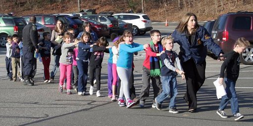 Shannon Hicks/Newtown Bee, via Associated Press